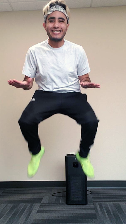 Dallas, Fresno personal trainer, performing a tuck jump.