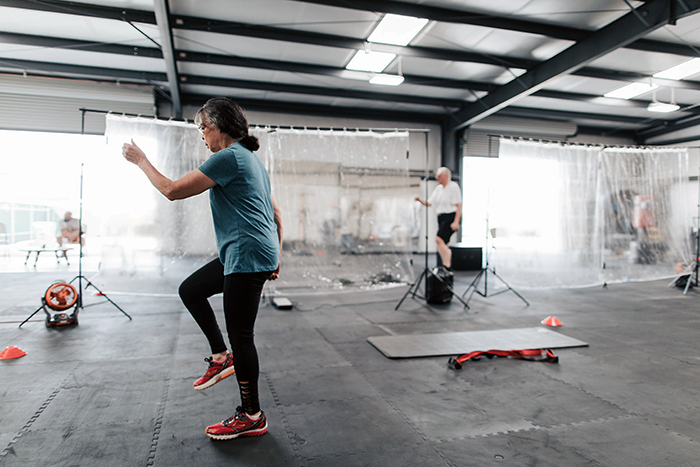 A small group of cancer survivors working out in a specialized exercise class