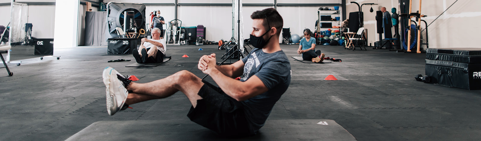 Instructor demonstrating an exercise for the core
